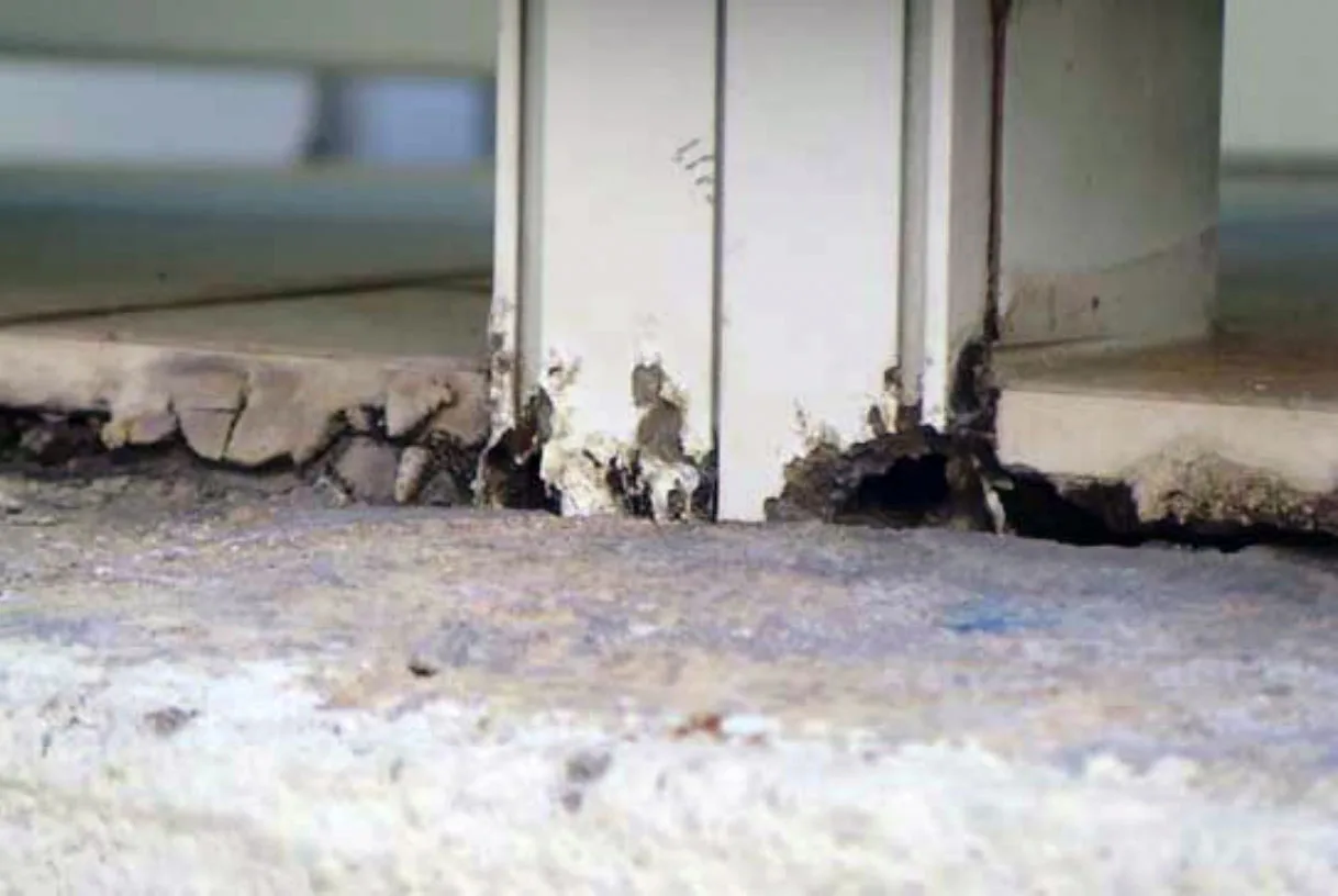 Photo of corroding rail needs railing replacement.