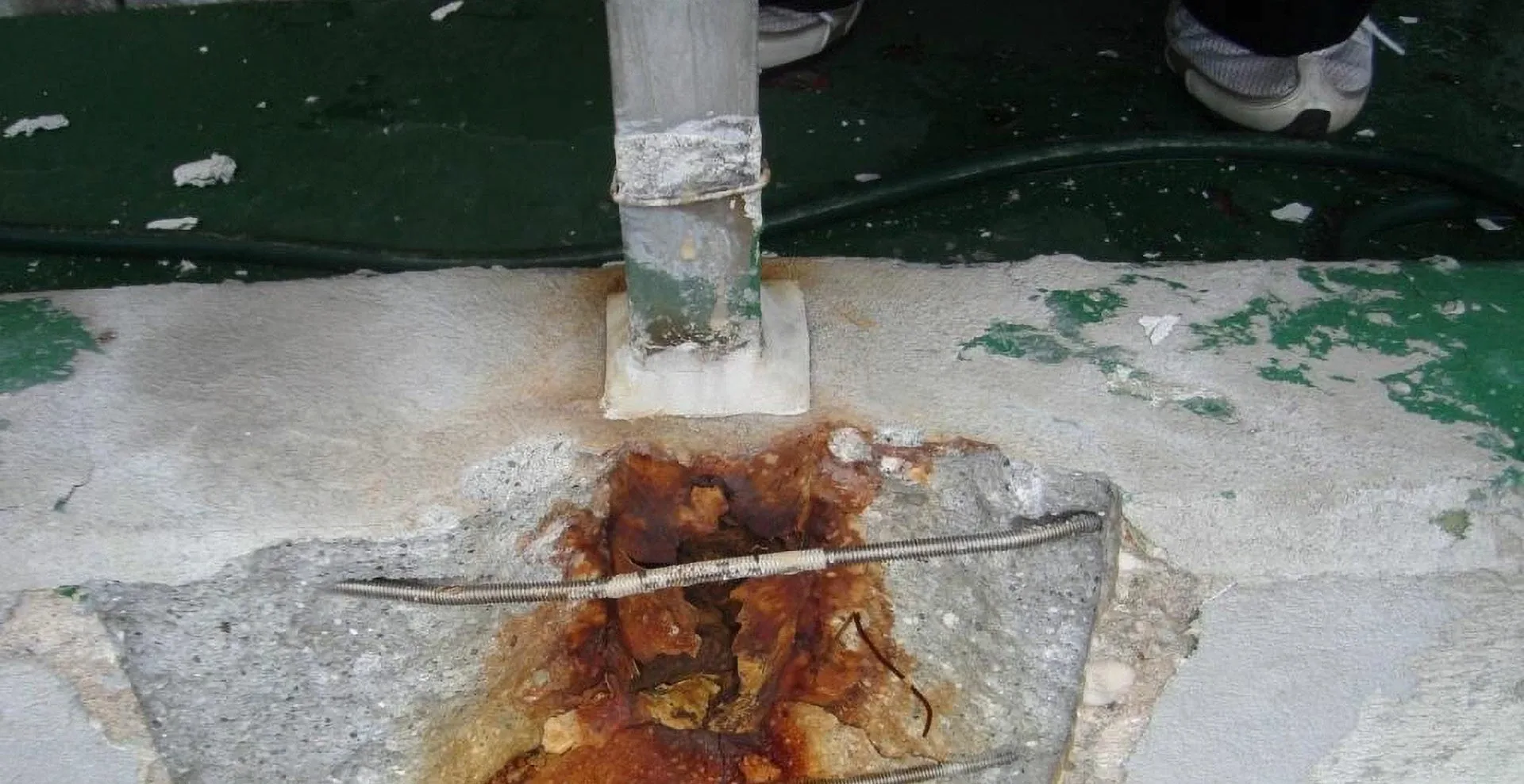 Concrete spalling will require both railing replacement as well as concrete repair.