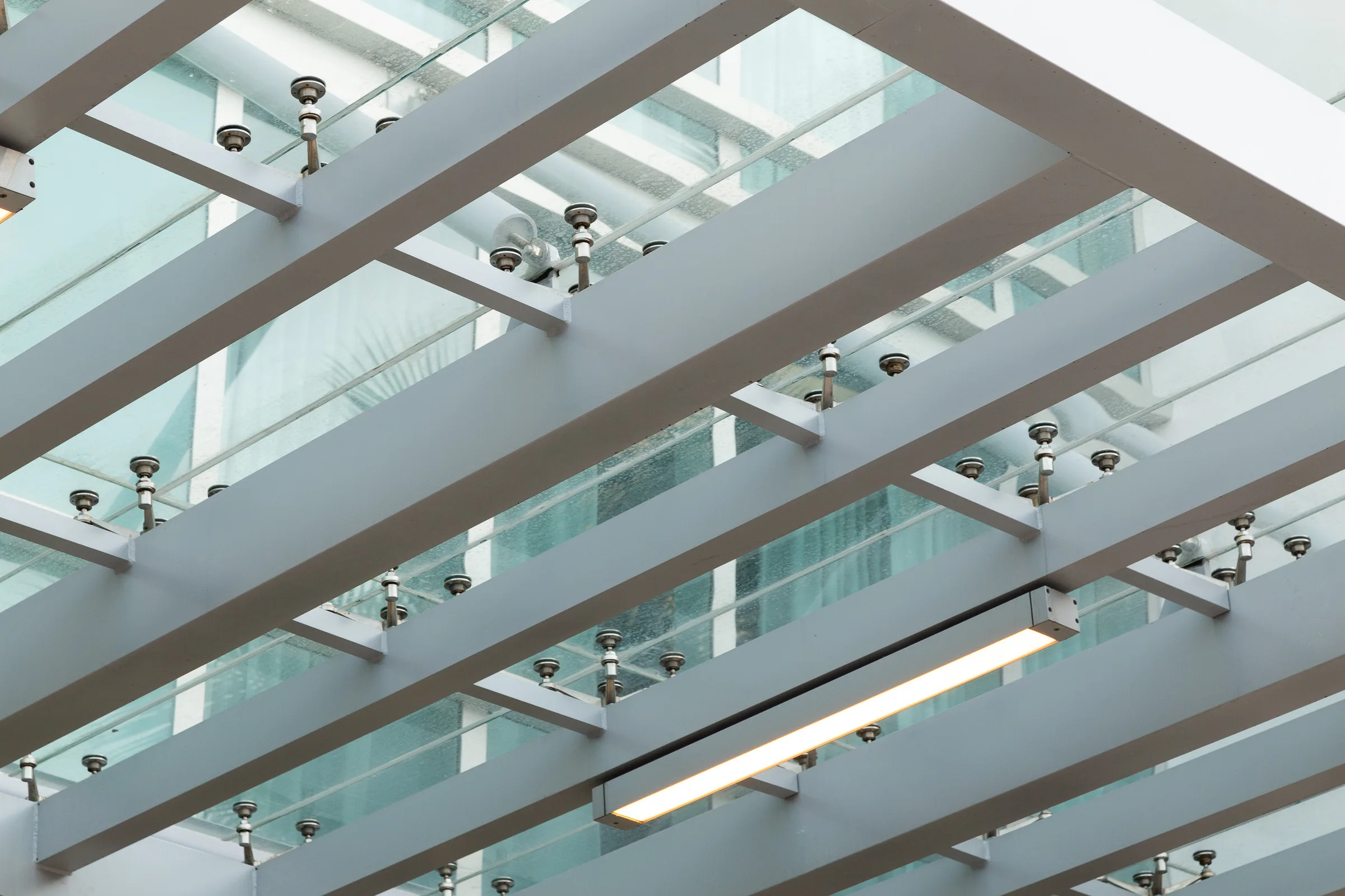 Marriott Surfside: Custom glass and metal fabrication by Poma