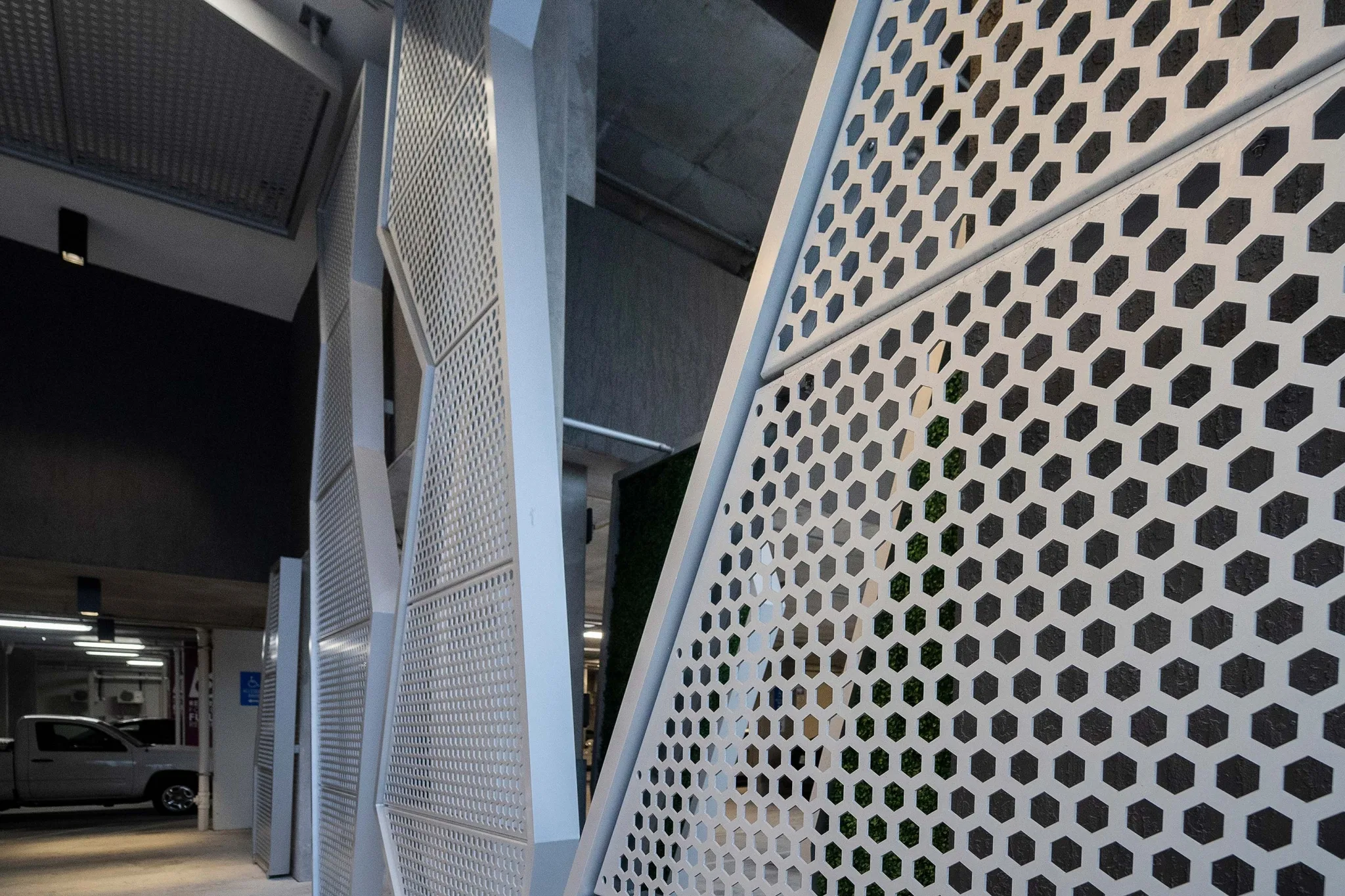 Modera Edgewater entrance, detail of the perforated metal dividers by Poma